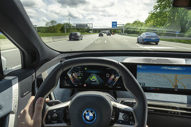 The company's first BMW iX model with a hexagon steering wheel (photo courtesy of the manufacturer)