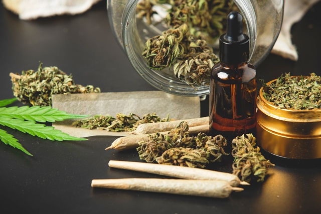 Marijuana buds with marijuana joints and Cannabis oil